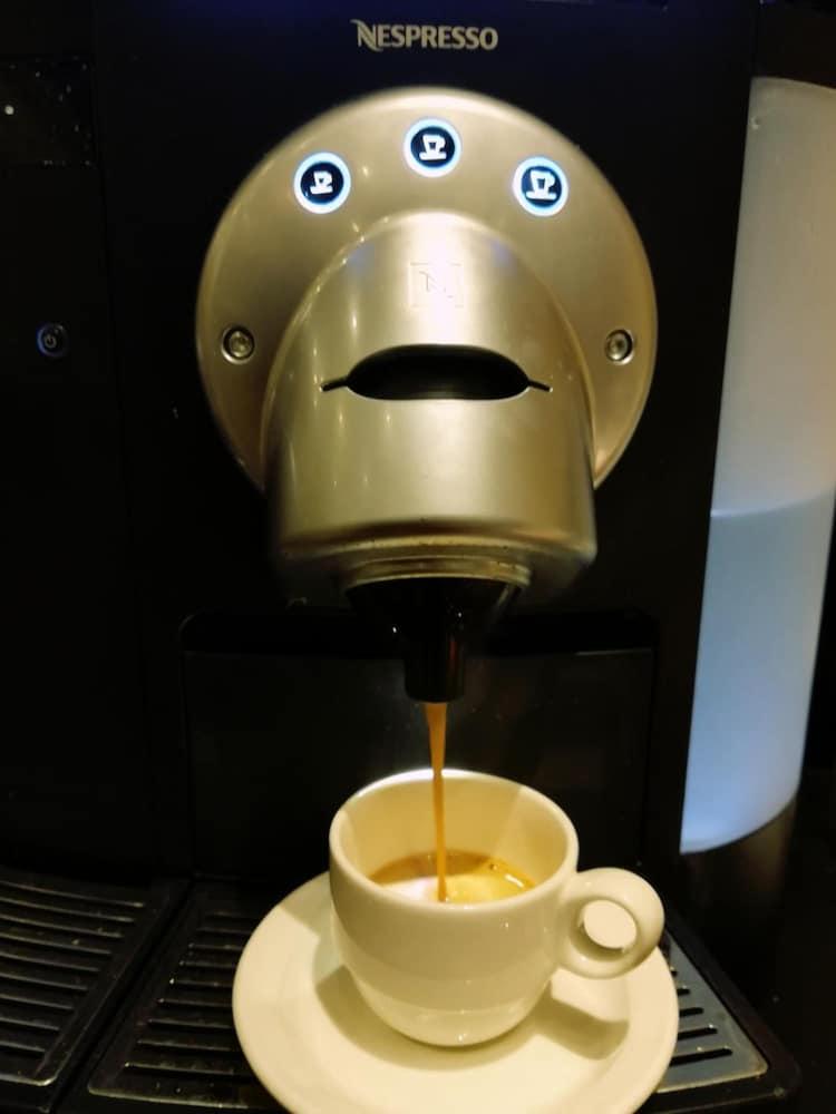 Hotel Palafox Zaragoza Exteriör bild A Nespresso machine